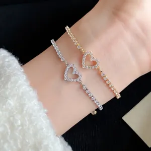 Elegant sparkling zircon heart pendant tennis bracelets in polished gold and silver finishes