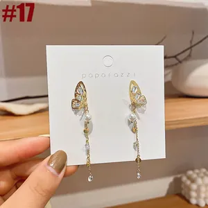 French style elegant long tassel earrings featuring gold butterfly and pearl drops