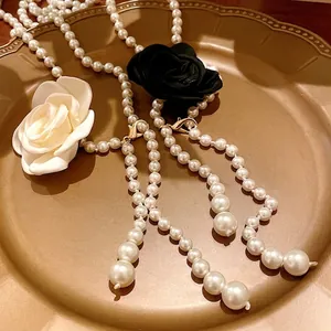 Vintage long pearl necklace with fabric flower charm sweater chain