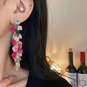 Elegant silver needle tassel earrings featuring pink roses and sparkling crystals for women