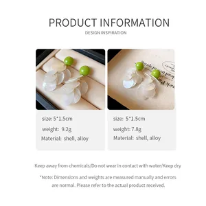 Detail showing green bead and shell tassel earrings with product dimensions and weight info.
