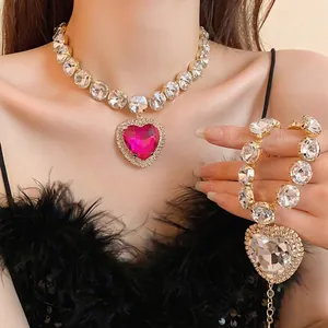 Sparkling pink heart crystal pendant necklace set with clear faceted stones for women