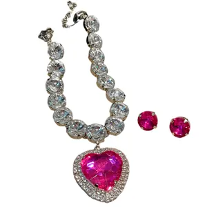 Luxury pink heart crystal necklace and earring set with shimmering oversized rhinestones