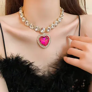Detailed shot of sparkling pink heart pendant rhinestone statement choker necklace