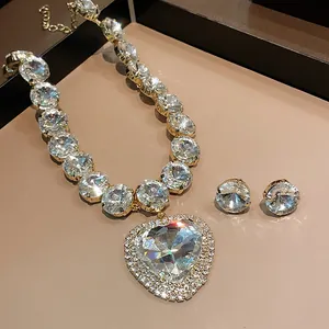 Heavy heart rhinestone pendant necklace and earring set with sparkling crystals