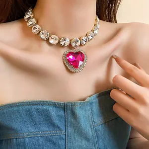 Elegant detailed view of a luxury pink heart crystal choker necklace on a model neck