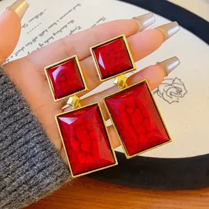 Vintage geometric red stone drop earrings in gold frame for a royal court style