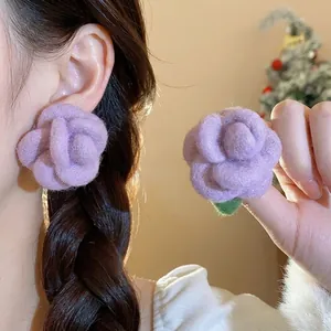 Elegant handmade purple felt rose flower stud earrings with a cozy winter aesthetic look