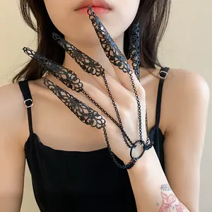 Gothic black filigree nail claw bracelet set with delicate finger chain detail view
