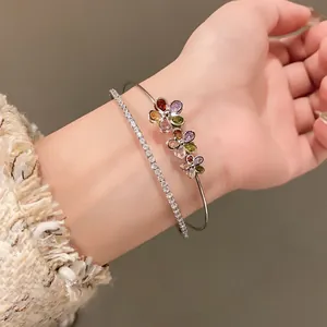 Elegant silver double-layer bangle with colorful zirconia flowers and a tennis chain