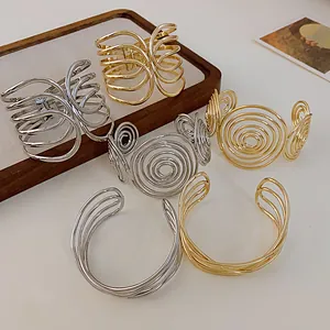 Stylish minimalist multi-layer open arm cuff bangles in polished gold and silver finishes