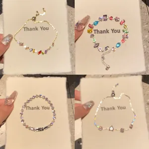 Set of four elegant zircon heart and geometric bracelets in gold and silver plating