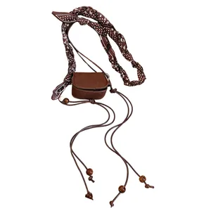 Vintage brown mini bag waist chain belt with paisley print fabric strap and decorative beads