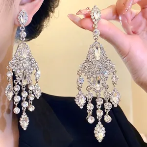 Luxurious silver needle rhinestone chandelier earrings with elegant waterdrop tassels