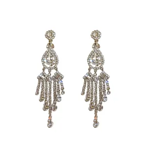 Elegant silver needle earrings with rhinestone water drop tassels and luxurious finish.