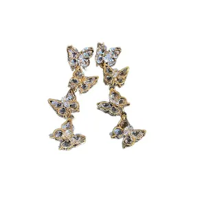Elegant gold-plated drop earrings featuring sparkling zircon butterfly tassel design
