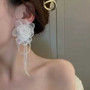 Elegant white fabric flower earrings with crystal beaded tassels in French vintage style.