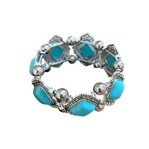 Vintage Bohemian elastic bracelet with acrylic turquoise rhombus beads and silver accents