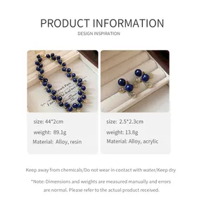 Detail view of vintage resin necklace and earrings with product size and material info.
