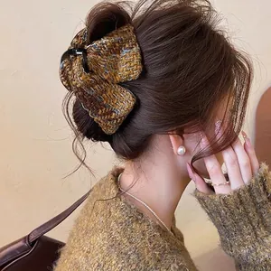 Elegant brown tweed bow hair claw clip for women sweet bun hairstyle fashion accessory