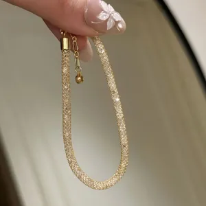 Elegant gold crystal mesh stardust bracelet with adjustable extension chain for women