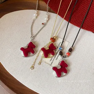 Exquisite red flocked rocking horse necklaces with pearls and zircon stone details