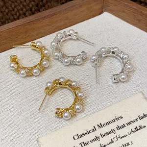 Elegant French style C-shape hoop earrings with white pearls and micro-pave zircons.
