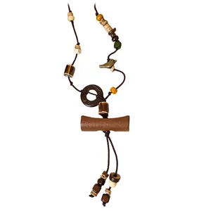 Handmade Bohemian ethnic long necklace with wood, coconut shell and ceramic beads