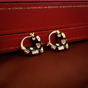 Créoles vintage en forme de cœur en argent avec motif animalier en émail noir et blanc