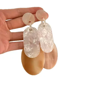 Oversized acrylic geometric earrings with light pink marbled texture for women