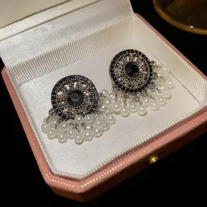 Vintage black rhinestone and pearl fringe tassel stud earrings in a pink jewelry box