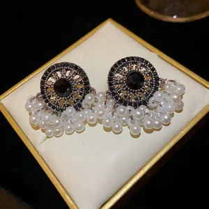 Vintage ethnic style silver needle earrings with black stones and faux pearl tassels