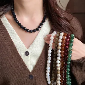 Collier de perles de style vintage avec des motifs de marbre élégants pour femme