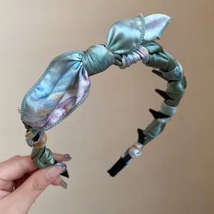 Elegant vintage bow headband wrapped in artistic floral silk scarf fabric hair accessory