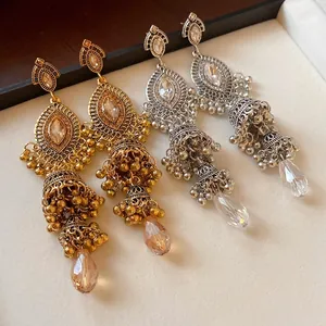 Vintage bohemian crystal Jhumka drop earrings with teardrop pendants in gold and silver