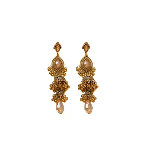 Vintage gold palace style dangle earrings with champagne teardrop gemstones.