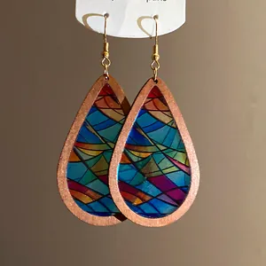 Bohemian wooden teardrop earrings featuring a vibrant stained-glass style print