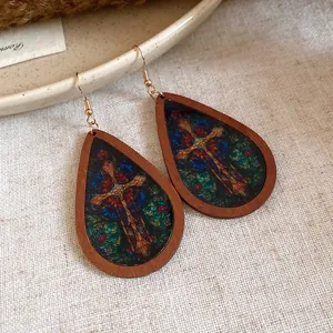 Vintage Bohemian wooden teardrop earrings with colorful cross print detail