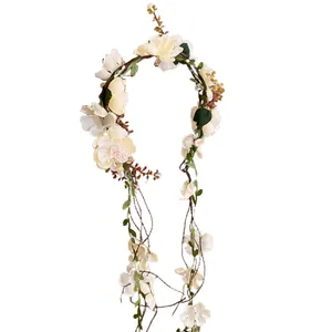 Handmade elegant forest style floral wreath headband featuring long trailing flower vines