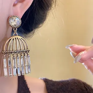Vintage silver needle drop earrings with zircon crystals and hollow tassel design