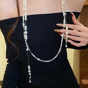 Elegant double-layer faux pearl beaded necklace featuring a vintage water drop pendant