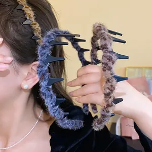 Macro detail of soft plush leopard print headbands featuring non-slip inner teeth for hair