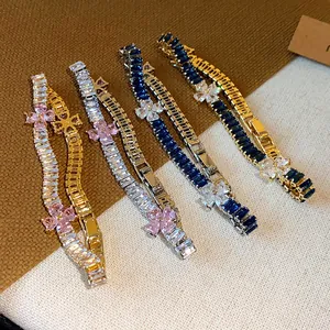 Elegante Zirkonia Herz-Blumen-Armbänder in Gold und Silber mit rosa-blauen Steinen