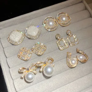 Elegant S925 silver needle pearl and rhinestone earrings with vintage geometric designs.