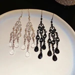Elegant baroque chandelier earrings featuring sparkling rhinestones and teardrop tassels