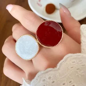 Elegant French vintage style round enamel rings in white and burgundy with gold trim