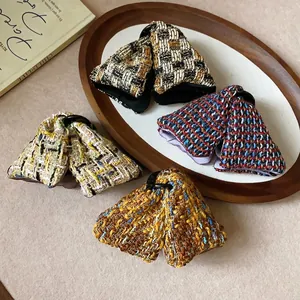 Elegant triangular tweed hair clips with vintage woven fabric texture in mixed colors