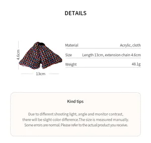 Detailed view of large plaid fabric triangular hair claw clip with measurements
