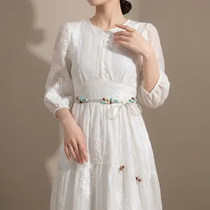 Bohemian hand-woven waist chain with colorful acrylic beads featured on white dress
