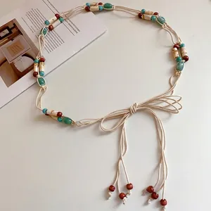 Stylish Bohemian hand-woven cream rope waist chain with turquoise and acrylic beads for women